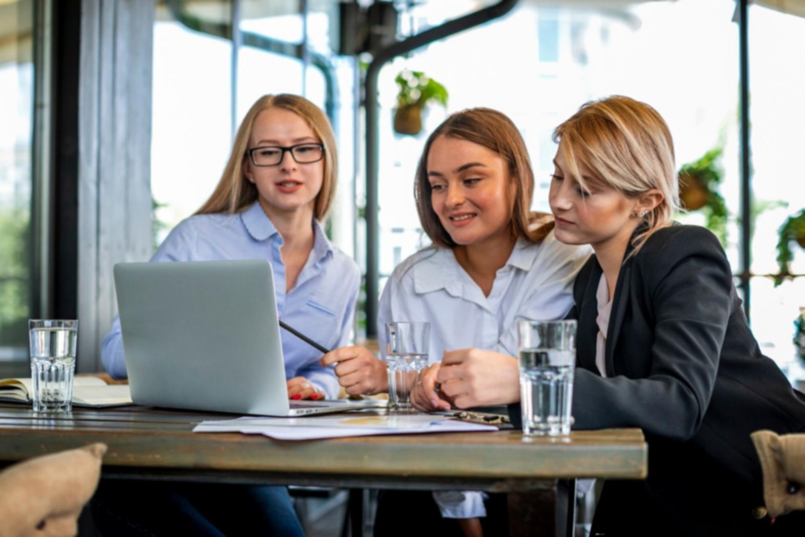 Detailed financial analysis materials and strategic planning resources spread across workspace